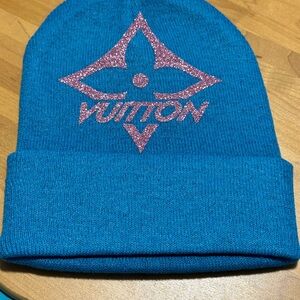 Blue Beanie with Pink Logo